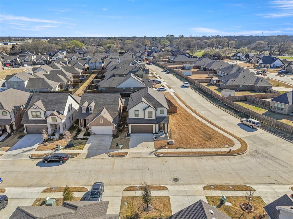 551 Ruthye Lane Pilot Point, TX 76258 - Photo 37 of 40 an aerial view of residential houses with outdoor space