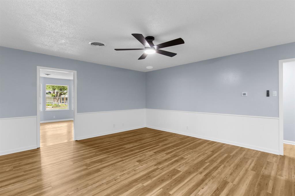 1818 Belden Street Sherman, TX 75092 - Photo 16 of 28 wooden floor in an empty room