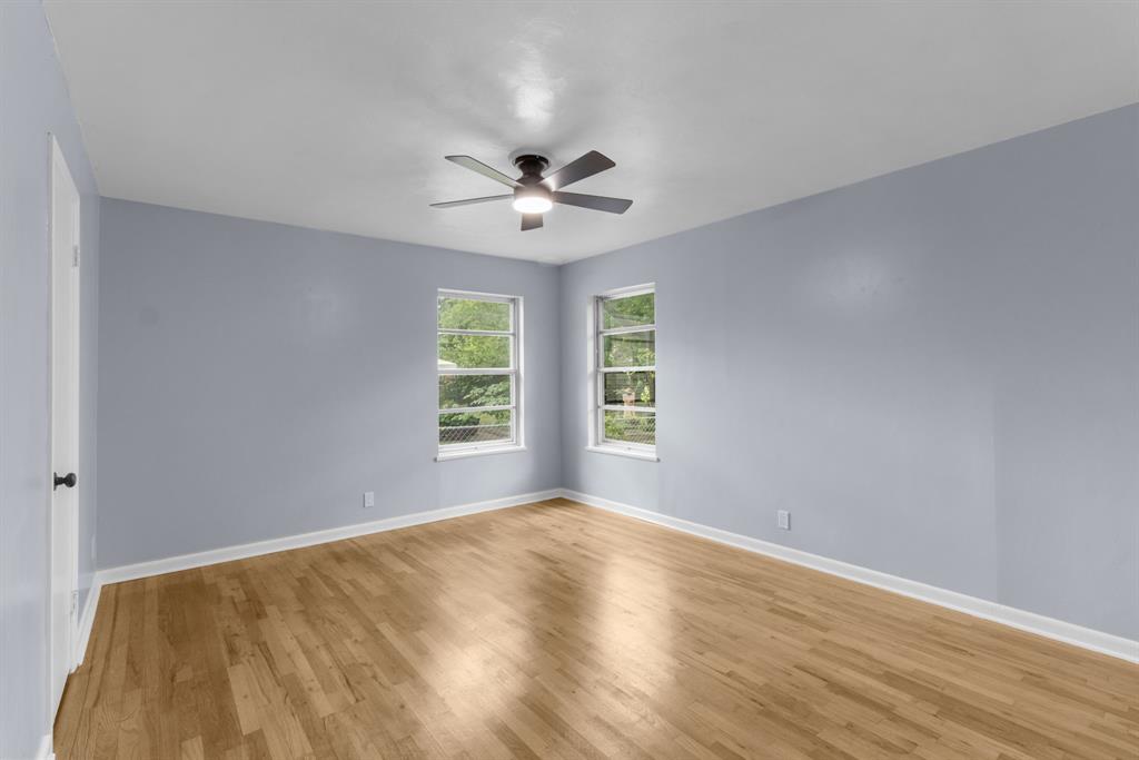 1818 Belden Street Sherman, TX 75092 - Photo 18 of 28 a view of an empty room with a window