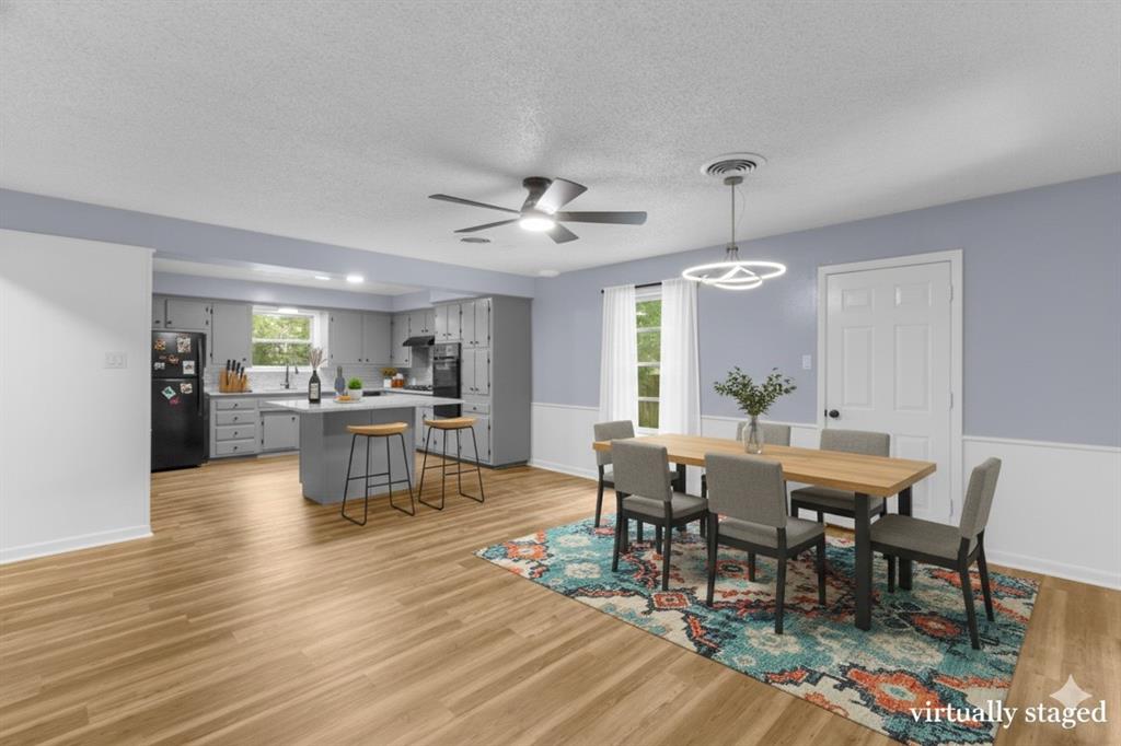 1818 Belden Street Sherman, TX 75092 - Photo 3 of 28 a view of a dining room with furniture