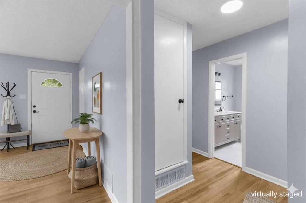 1818 Belden Street Sherman, TX 75092 - Photo 5 of 28 a view of livingroom with furniture and wooden floor