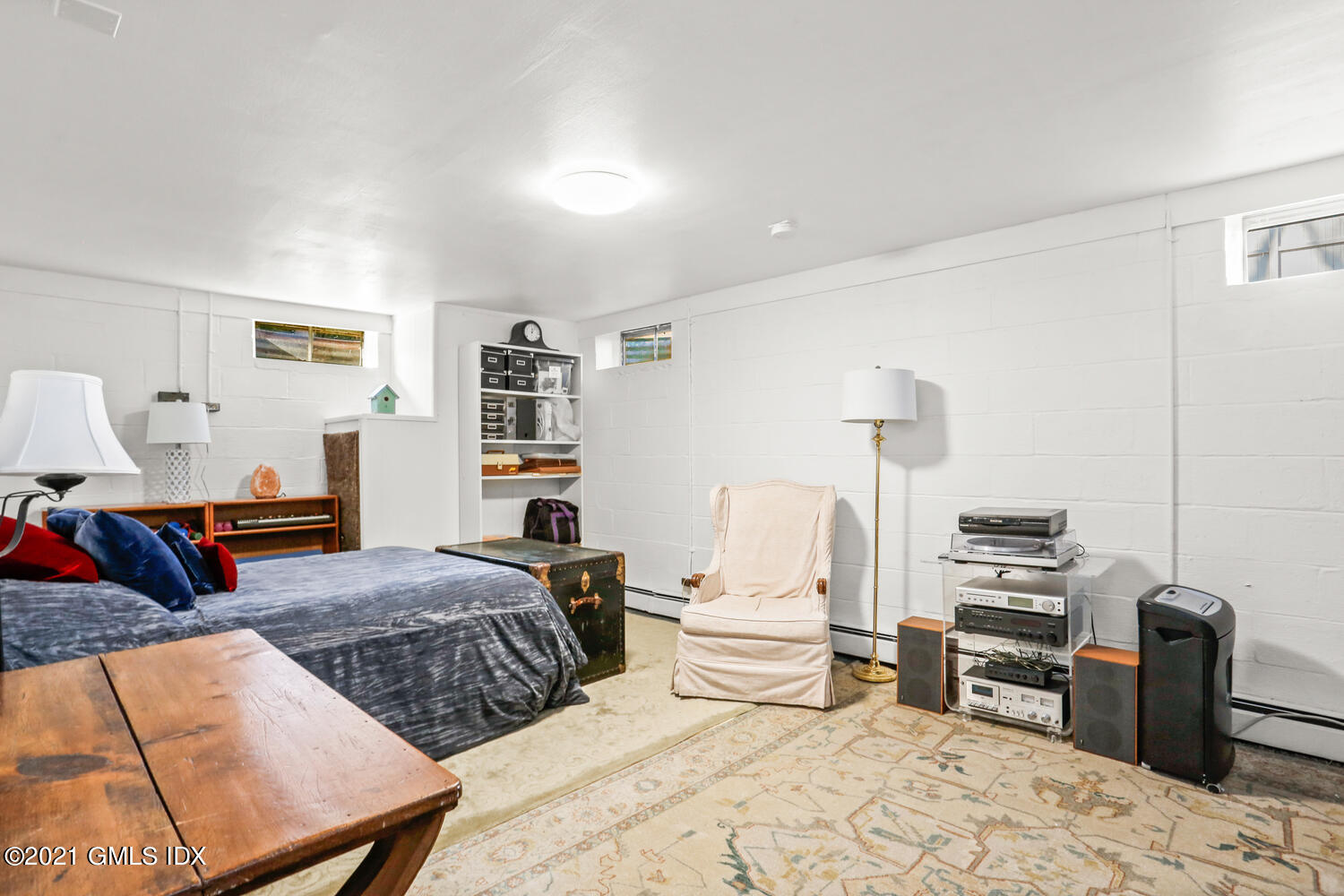 29 Thorn Hill Road Riverside, CT 06878 - Photo 14 of 24 a bedroom with furniture and a couch