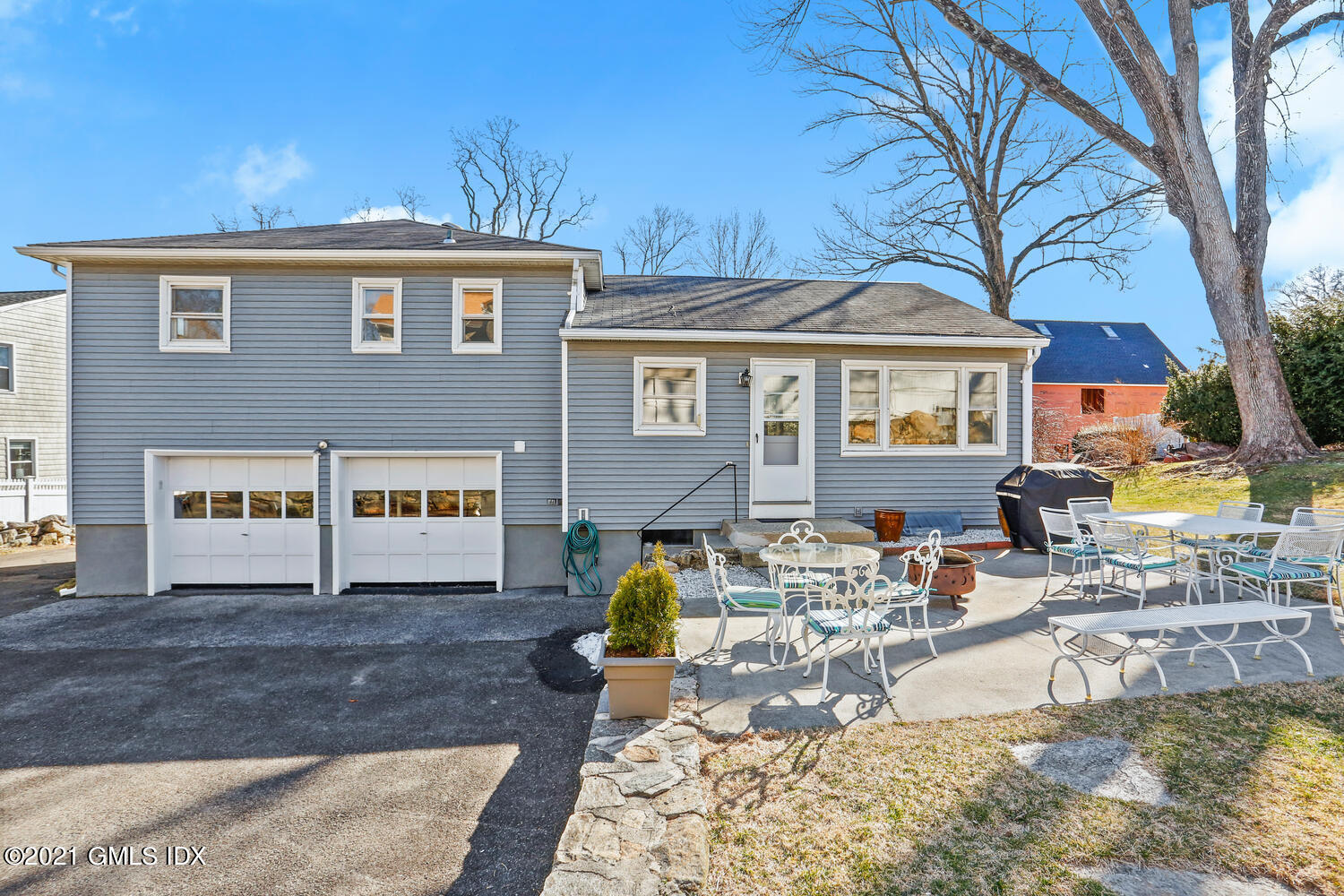 29 Thorn Hill Road Riverside, CT 06878 - Photo 20 of 24 a view of a house with swimming pool