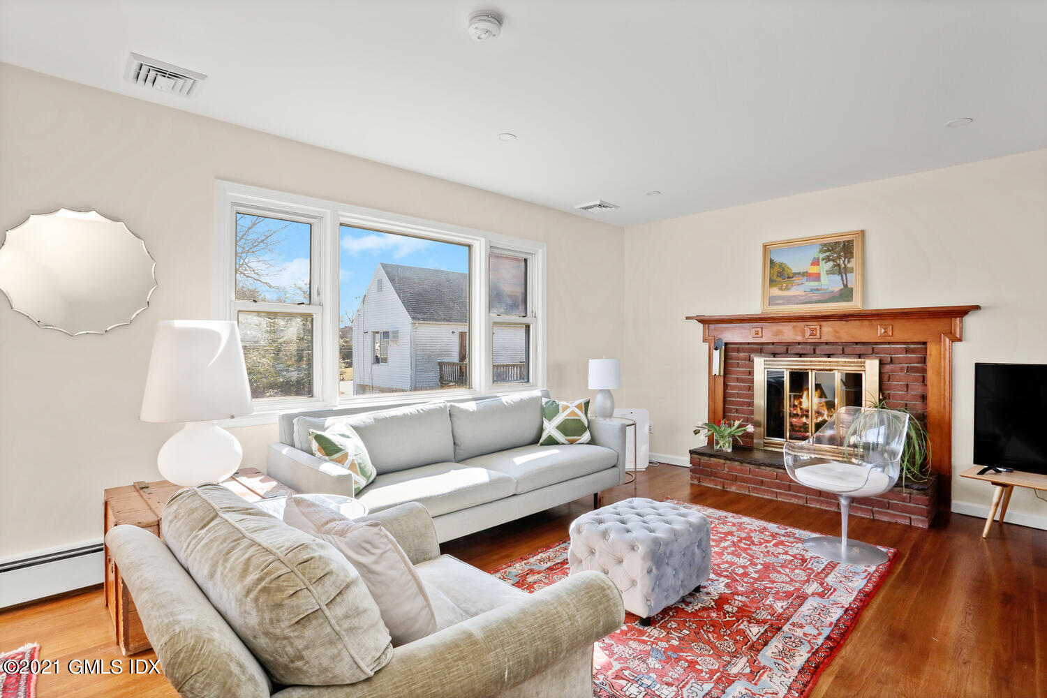29 Thorn Hill Road Riverside, CT 06878 - Photo 3 of 24 a living room with furniture and a large window