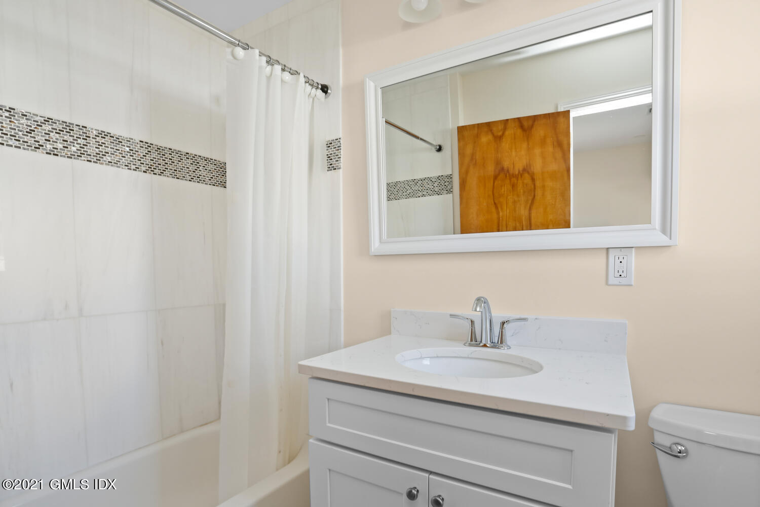 29 Thorn Hill Road Riverside, CT 06878 - Photo 10 of 24 a bathroom with a sink and a mirror