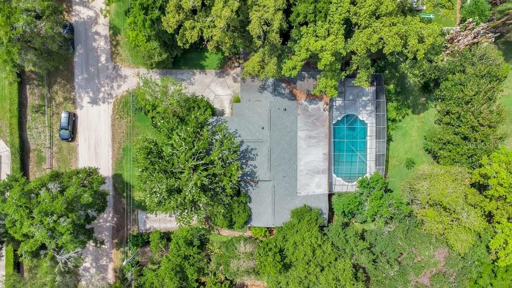 412 Forest Street Windermere, FL 34786 - Photo 23 of 34 an aerial view of a house with plants and trees in front of it