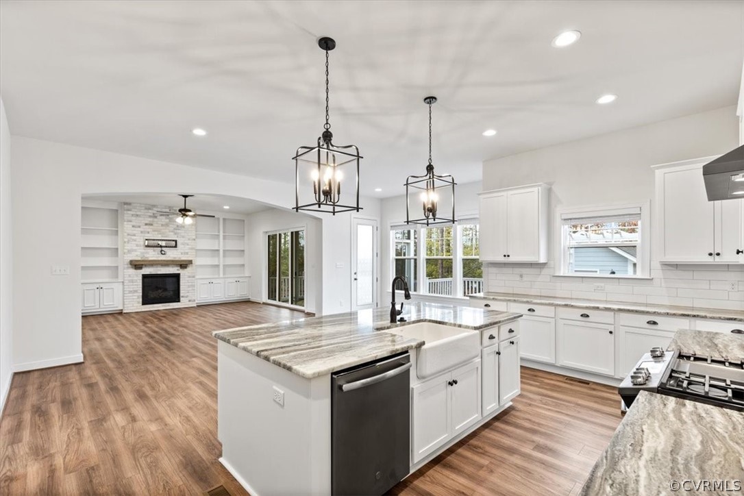 2514 Channelmark Place Chester, VA 23836 - Photo 20 of 50 a large kitchen with kitchen island a sink stainless steel appliances and cabinets