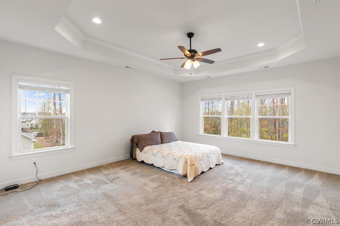 2514 Channelmark Place Chester, VA 23836 - Photo 28 of 50 a spacious bedroom with a large bed and a large window