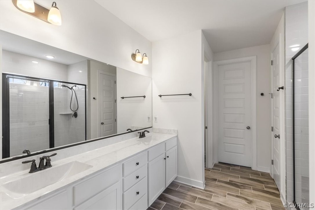 2514 Channelmark Place Chester, VA 23836 - Photo 30 of 50 a spacious bathroom with a double vanity sink double and mirror