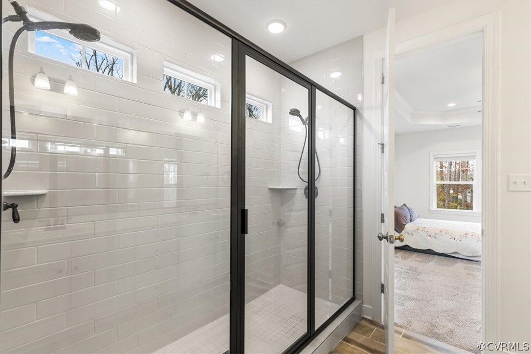 2514 Channelmark Place Chester, VA 23836 - Photo 31 of 50 a bathroom with a glass door shower and a sink