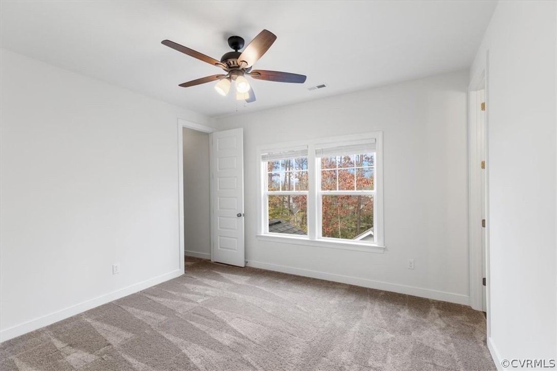 2514 Channelmark Place Chester, VA 23836 - Photo 38 of 50 a view of an empty room with a window