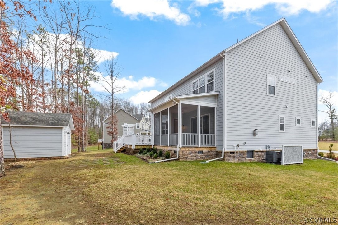 2514 Channelmark Place Chester, VA 23836 - Photo 41 of 50 a view of a house with a yard