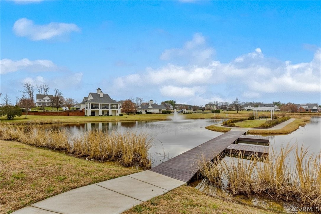 2514 Channelmark Place Chester, VA 23836 - Photo 46 of 50 a view of a lake with houses