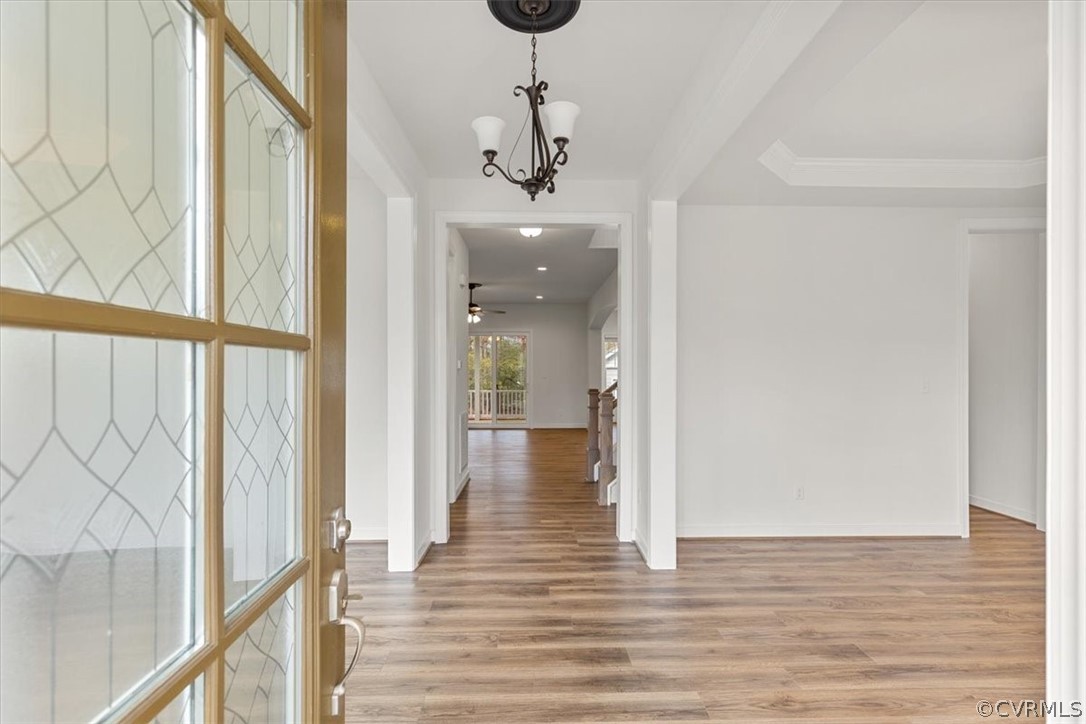 2514 Channelmark Place Chester, VA 23836 - Photo 5 of 50 a view of a hallway view with wooden floor and staircase