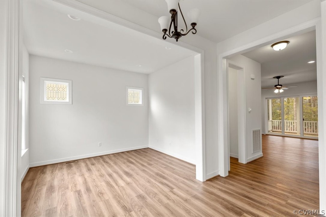 2514 Channelmark Place Chester, VA 23836 - Photo 7 of 50 a view of empty room with wooden floor and fan