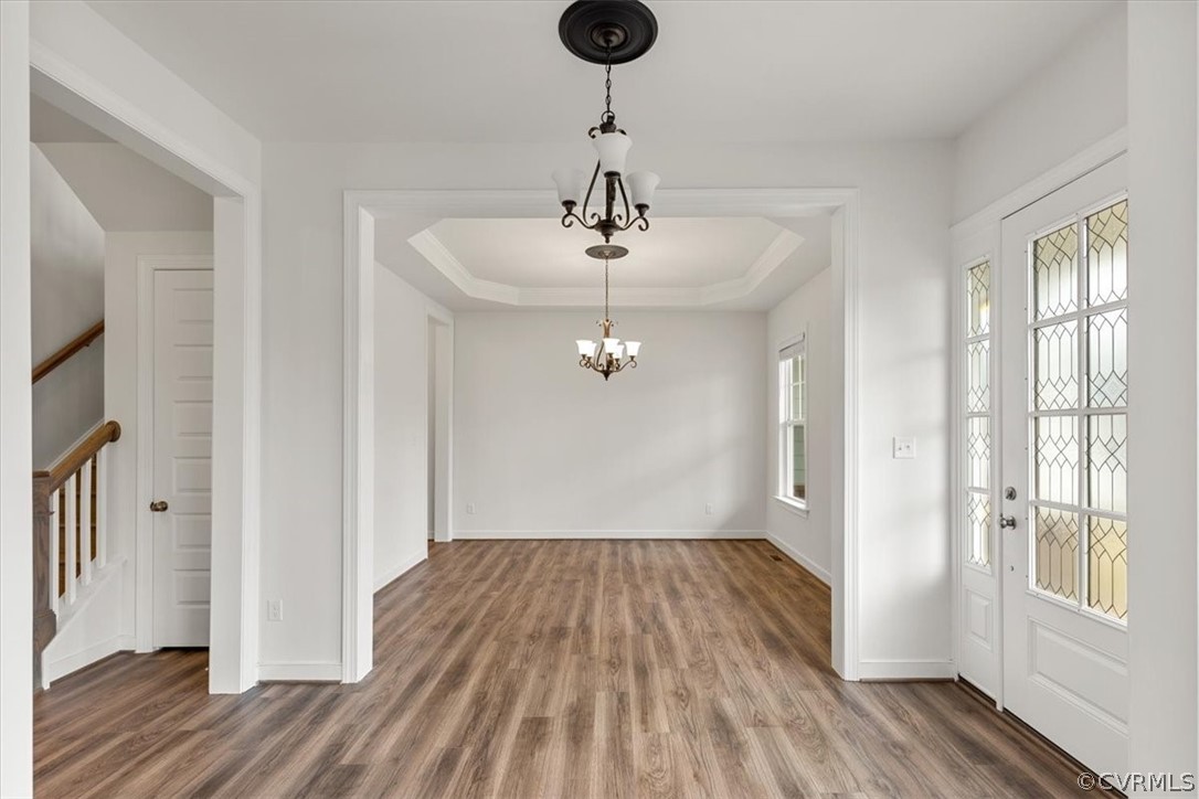 2514 Channelmark Place Chester, VA 23836 - Photo 9 of 50 a view of empty room with wooden floor and fan