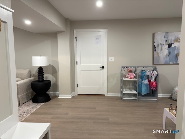 74 Soundview Avenue Fairfield, CT 06825 - Photo 17 of 32 a view of a livingroom with storage & utility