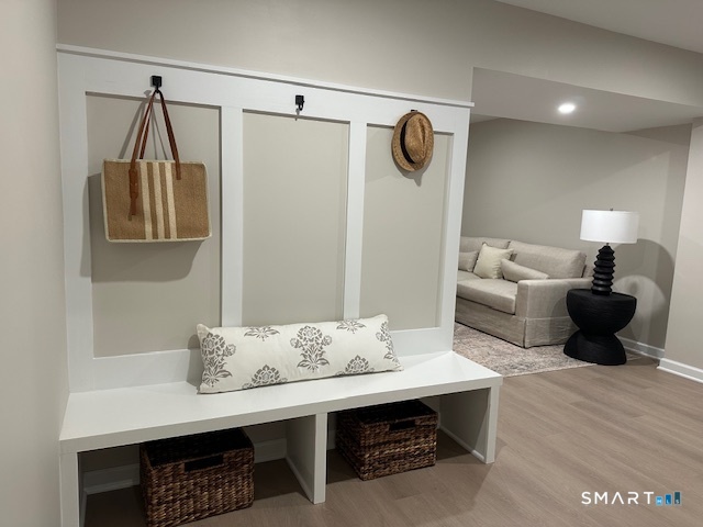 74 Soundview Avenue Fairfield, CT 06825 - Photo 18 of 32 a living room with furniture and a table