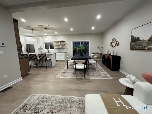 74 Soundview Avenue Fairfield, CT 06825 - Photo 6 of 32 a living room with furniture and a rug