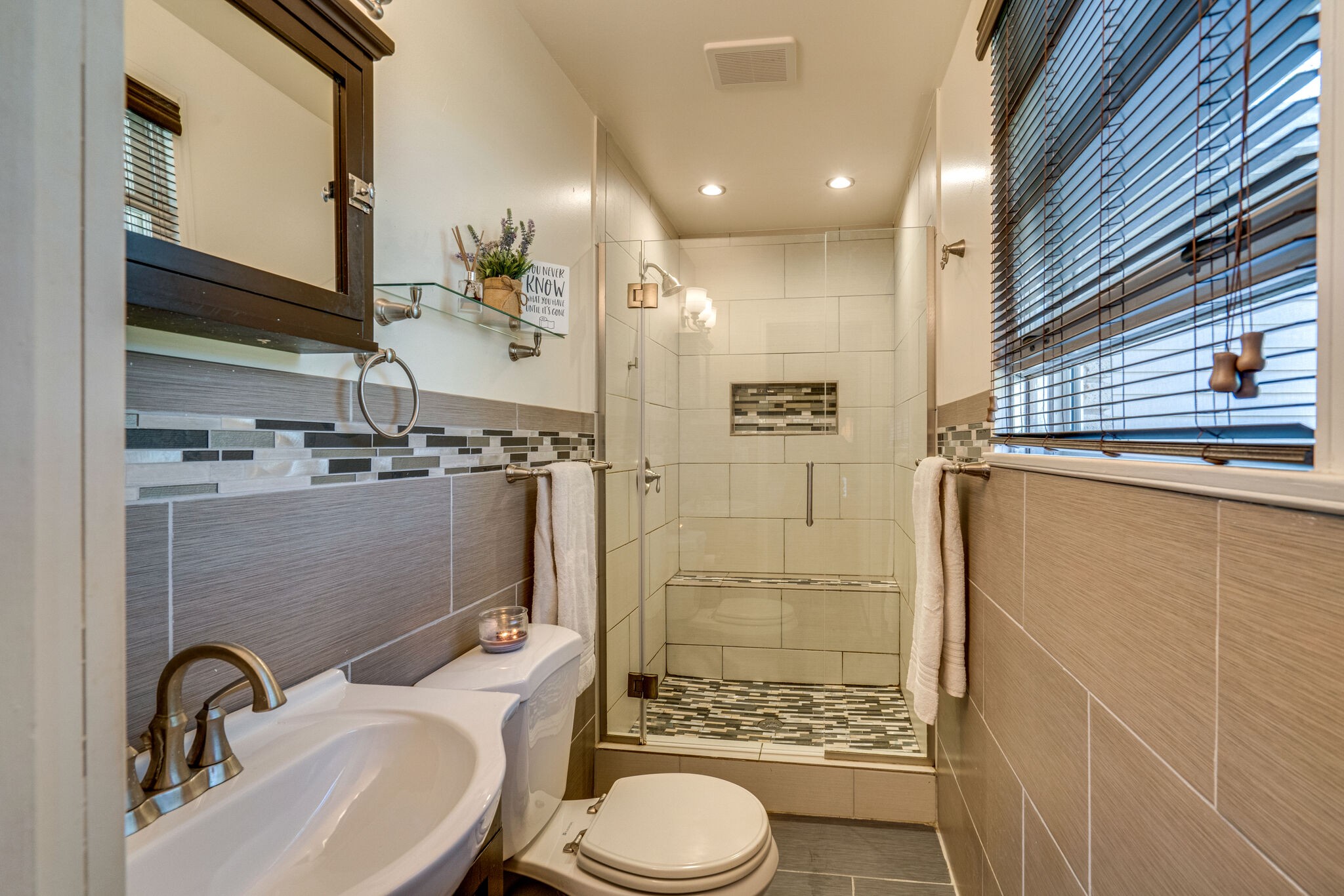 338 Stable Road Franklin, TN 37069 - Photo 16 of 26 a bathroom with a sink toilet and shower