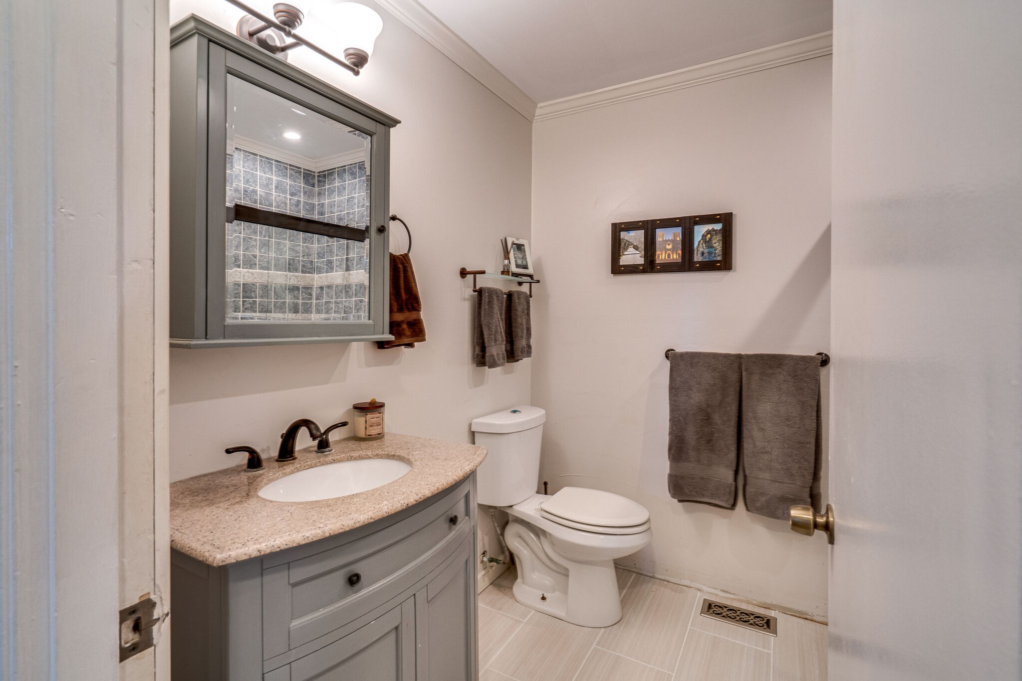 338 Stable Road Franklin, TN 37069 - Photo 19 of 26 a bathroom with a granite countertop sink toilet and mirror