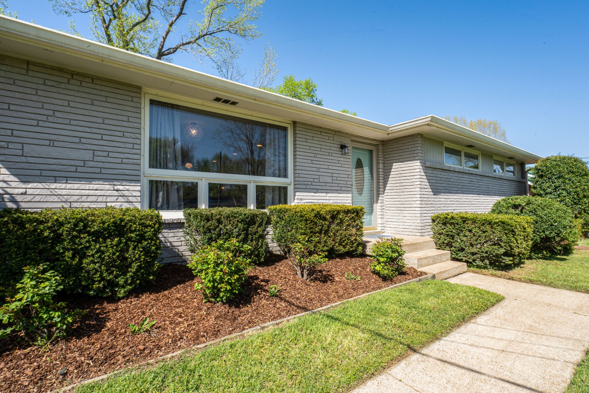 338 Stable Road Franklin, TN 37069 - Photo 3 of 26 a front view of a house with a yard