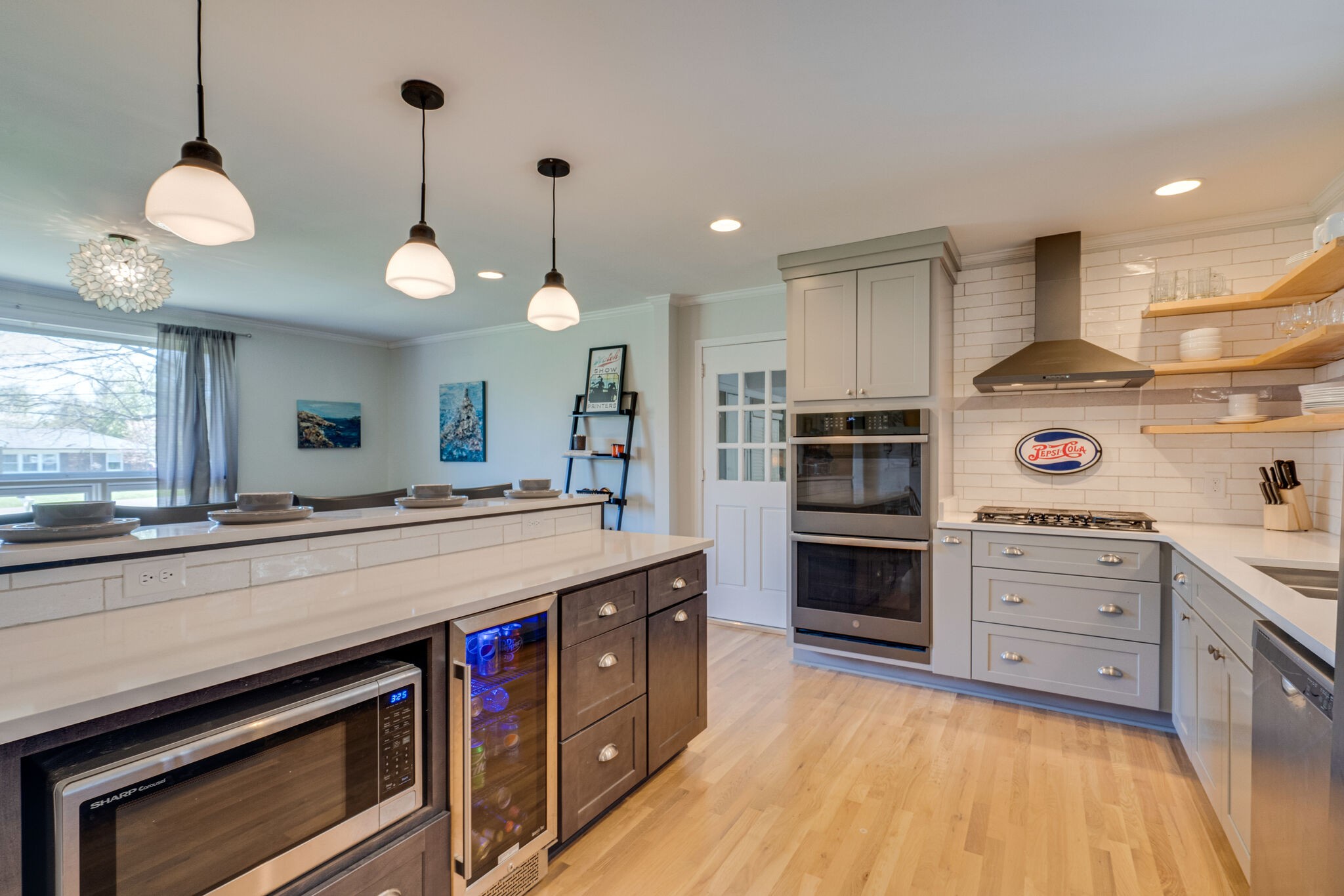 338 Stable Road Franklin, TN 37069 - Photo 7 of 26 a kitchen with kitchen island granite countertop a stove and a sink