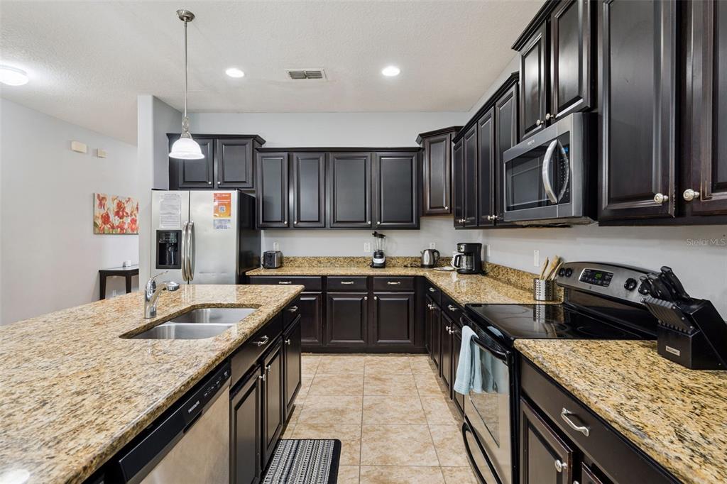 8898 Candy Palm Road Kissimmee, FL 34747 - Photo 5 of 47 Gallery Image 5