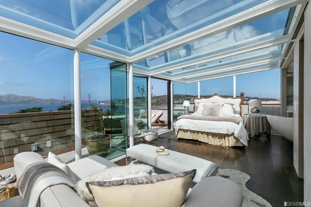 a view of a living room and entry way