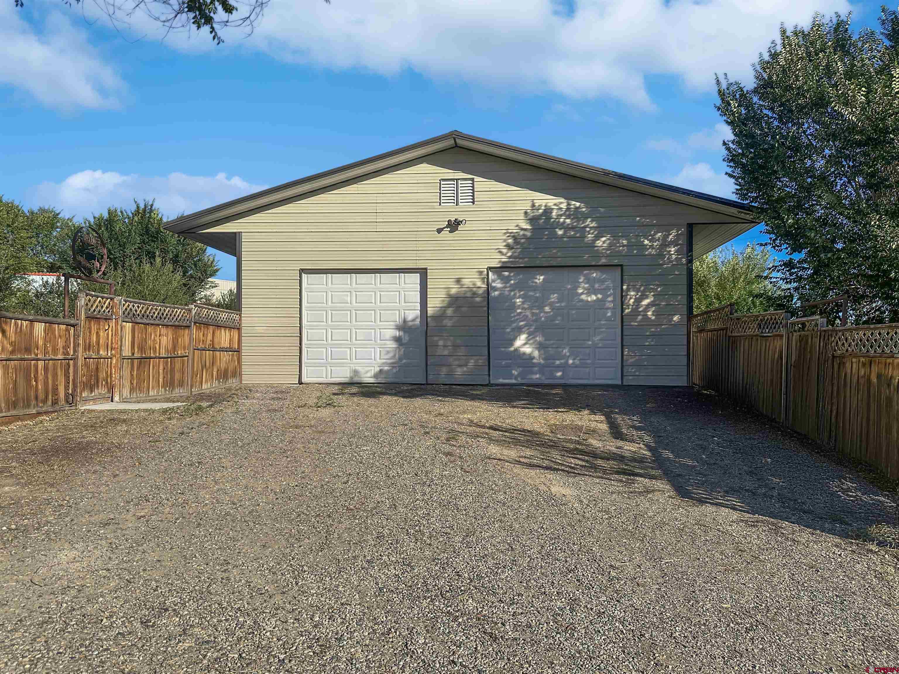 240 F Street Crawford, CO 81415 - Photo 39 of 45 a front view of a house with a yard