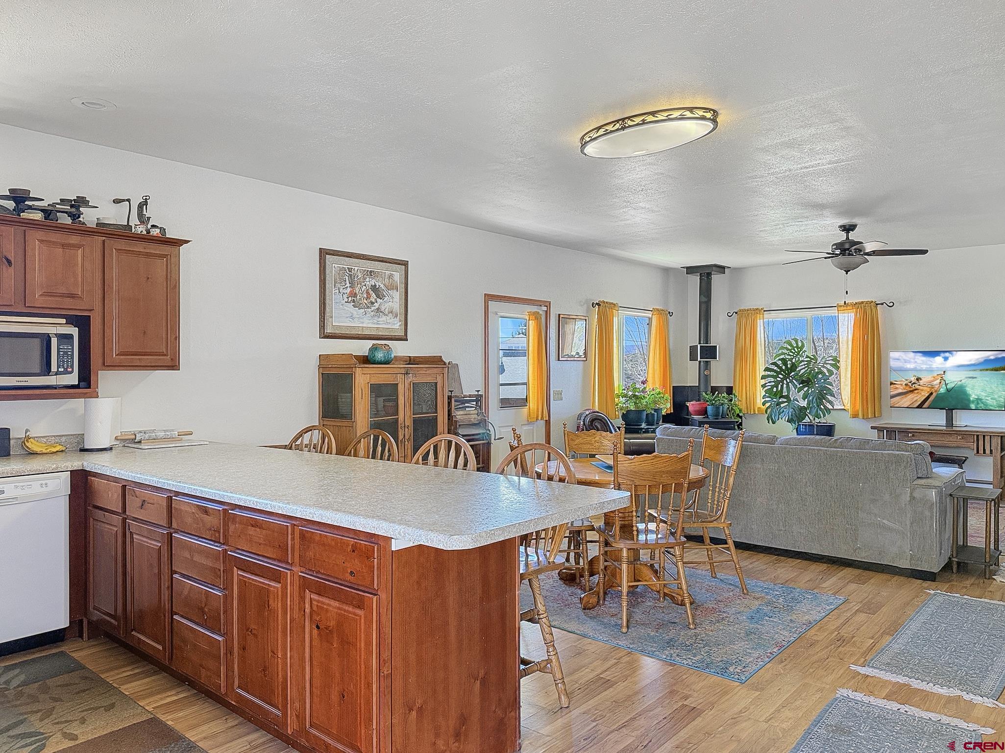 240 F Street Crawford, CO 81415 - Photo 4 of 45 a view of a dining room with furniture window and wooden floor