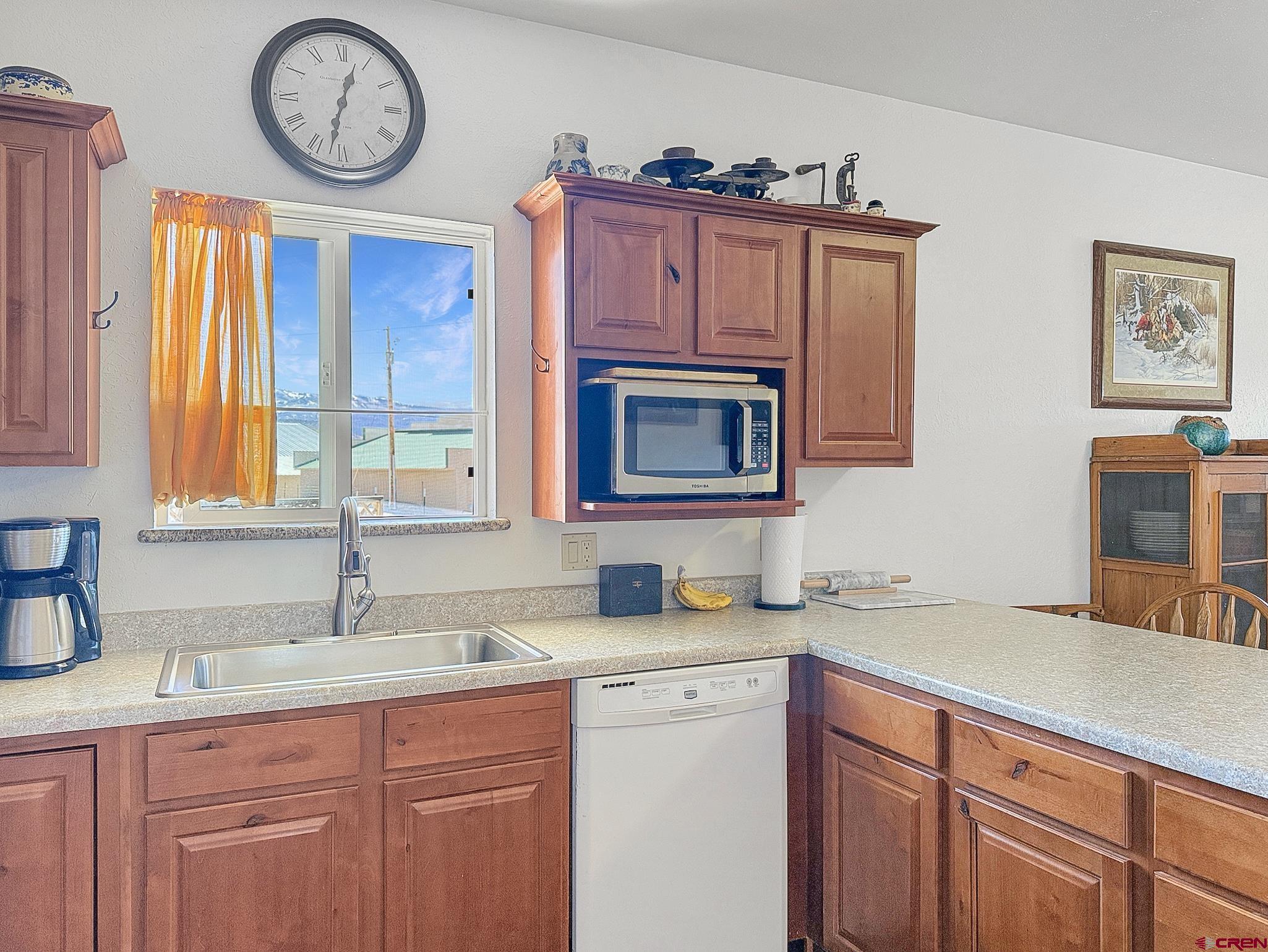 240 F Street Crawford, CO 81415 - Photo 6 of 45 a bathroom with a sink and a large mirror