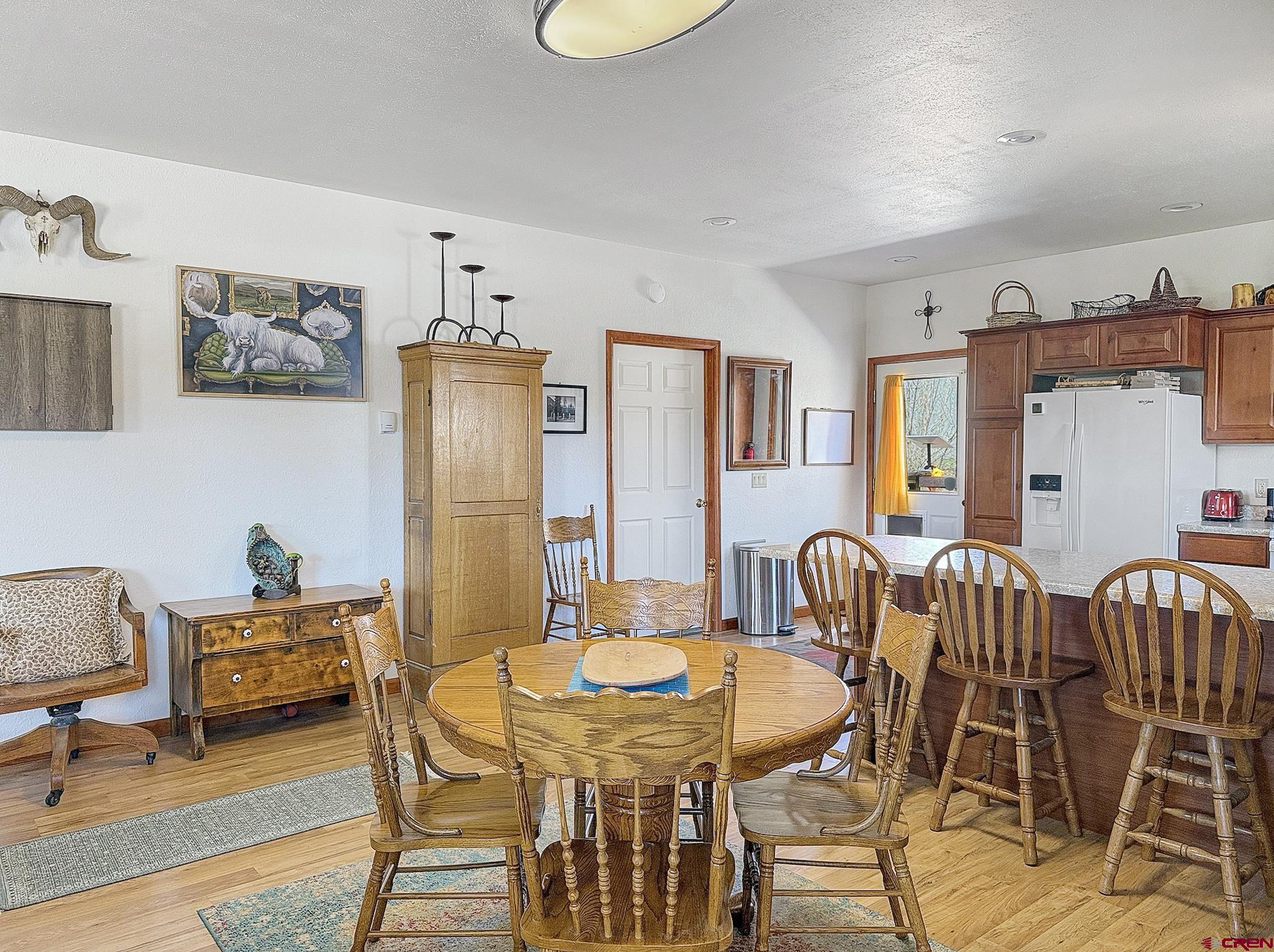 240 F Street Crawford, CO 81415 - Photo 7 of 45 a view of a dining room with furniture
