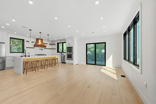 a kitchen with white cabinets