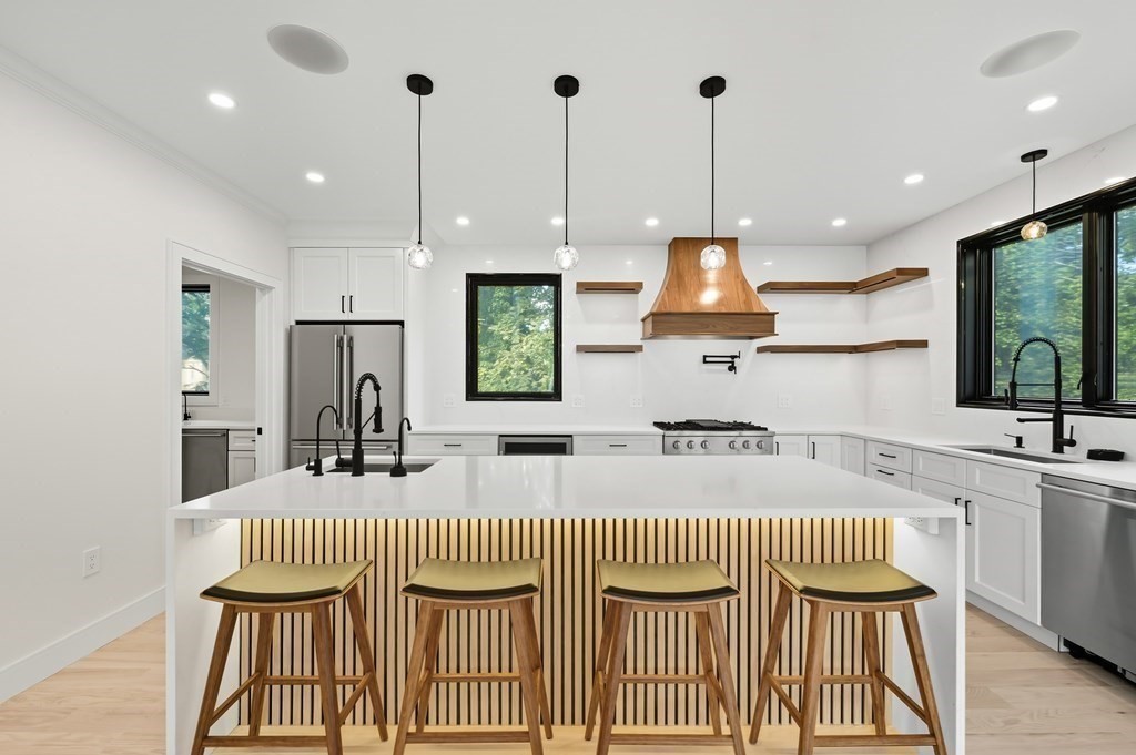 863 Main Street Reading, MA 01867 - Photo 4 of 42 a kitchen that has a lot of counter space and a window