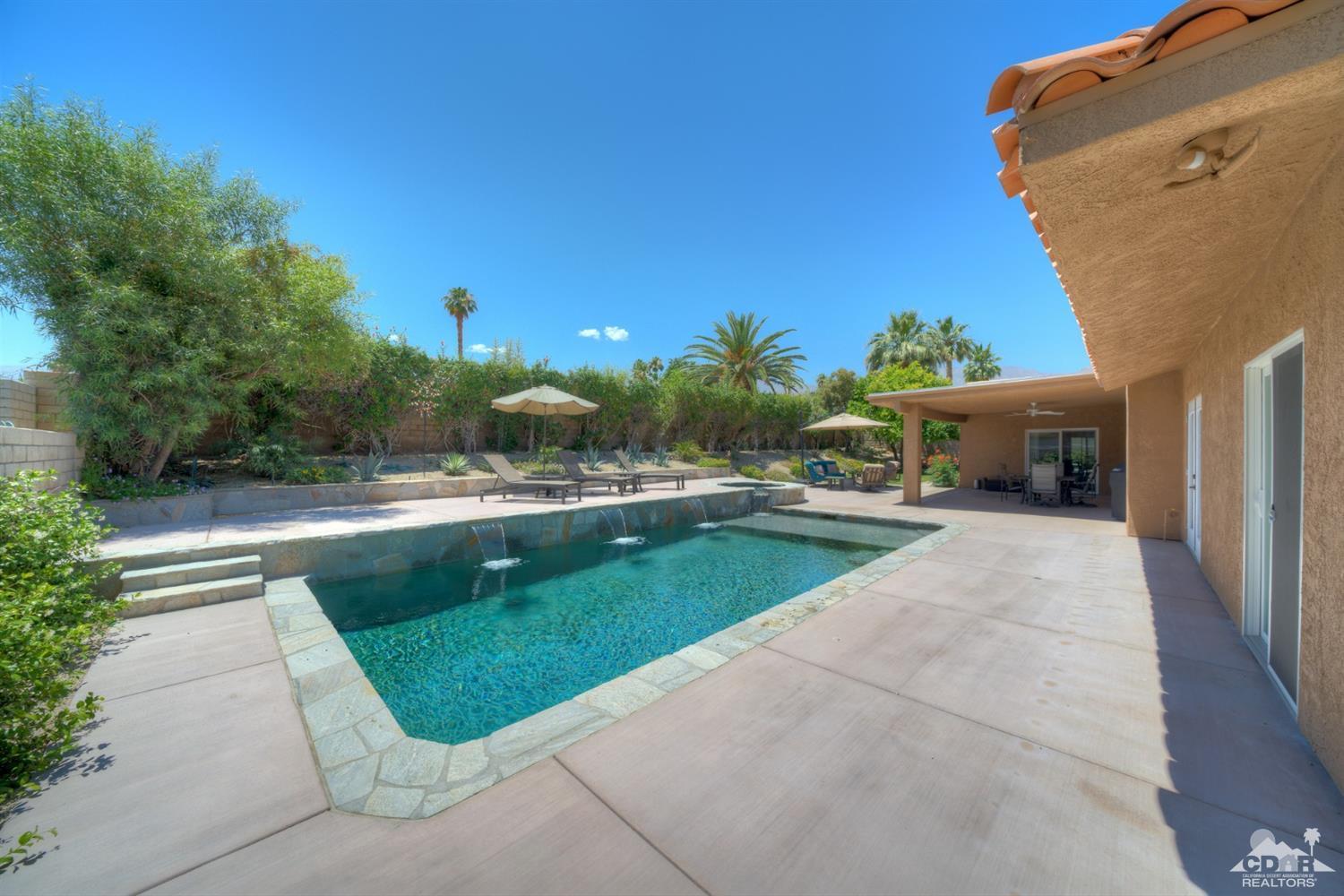 72671 Homestead Road Palm Desert, CA 92260 - Photo 31 of 39 a view of patio with swimming pool