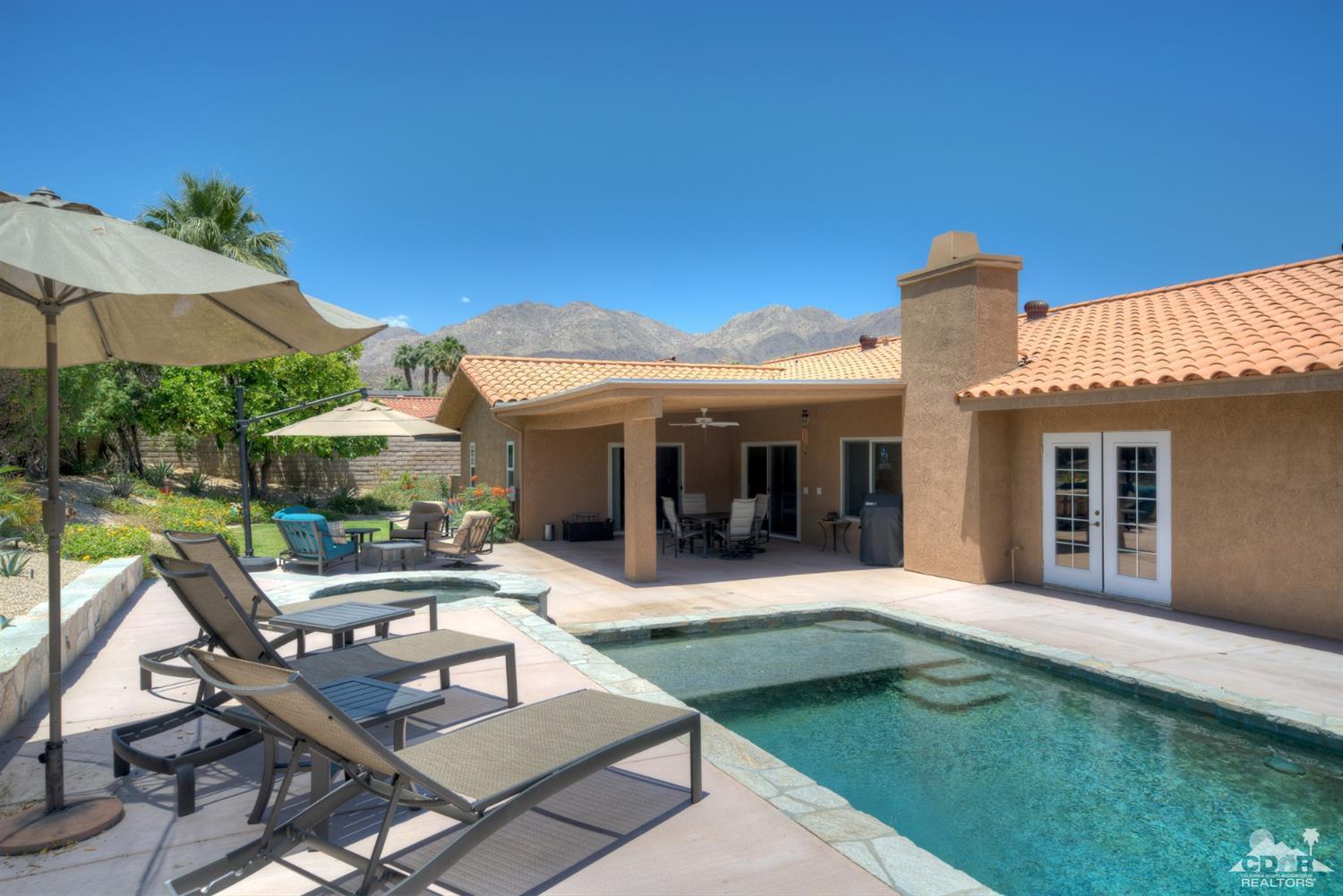 72671 Homestead Road Palm Desert, CA 92260 - Photo 34 of 39 a view of a house with backyard porch and sitting area