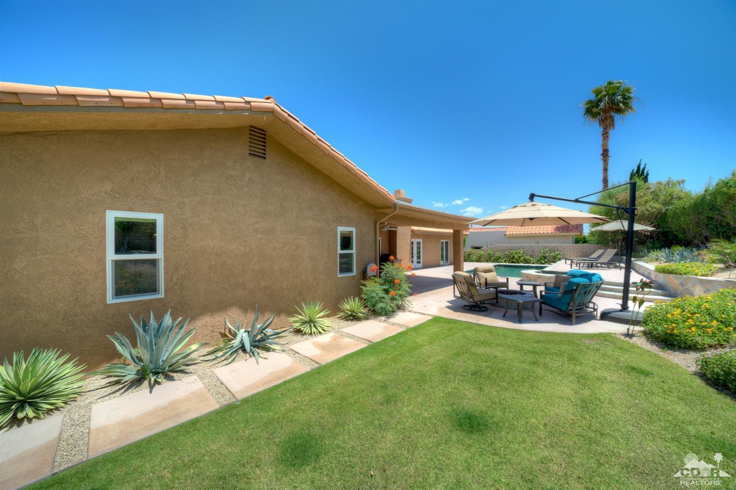 72671 Homestead Road Palm Desert, CA 92260 - Photo 39 of 39 a view of a house with backyard porch and sitting area