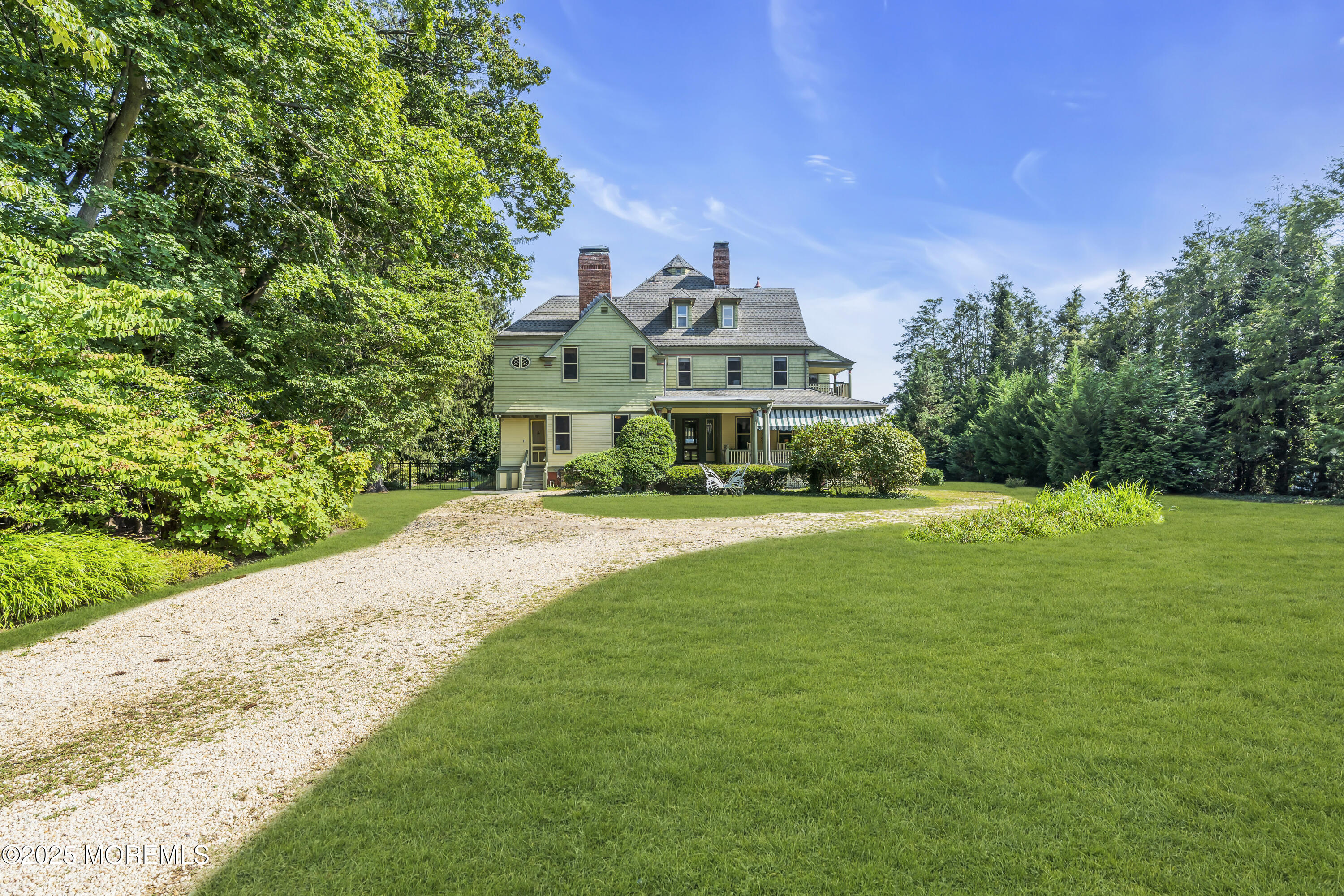458 Navesink River Road Red Bank, NJ 07701 - Photo 110 of 118 a front view of a house with a yard