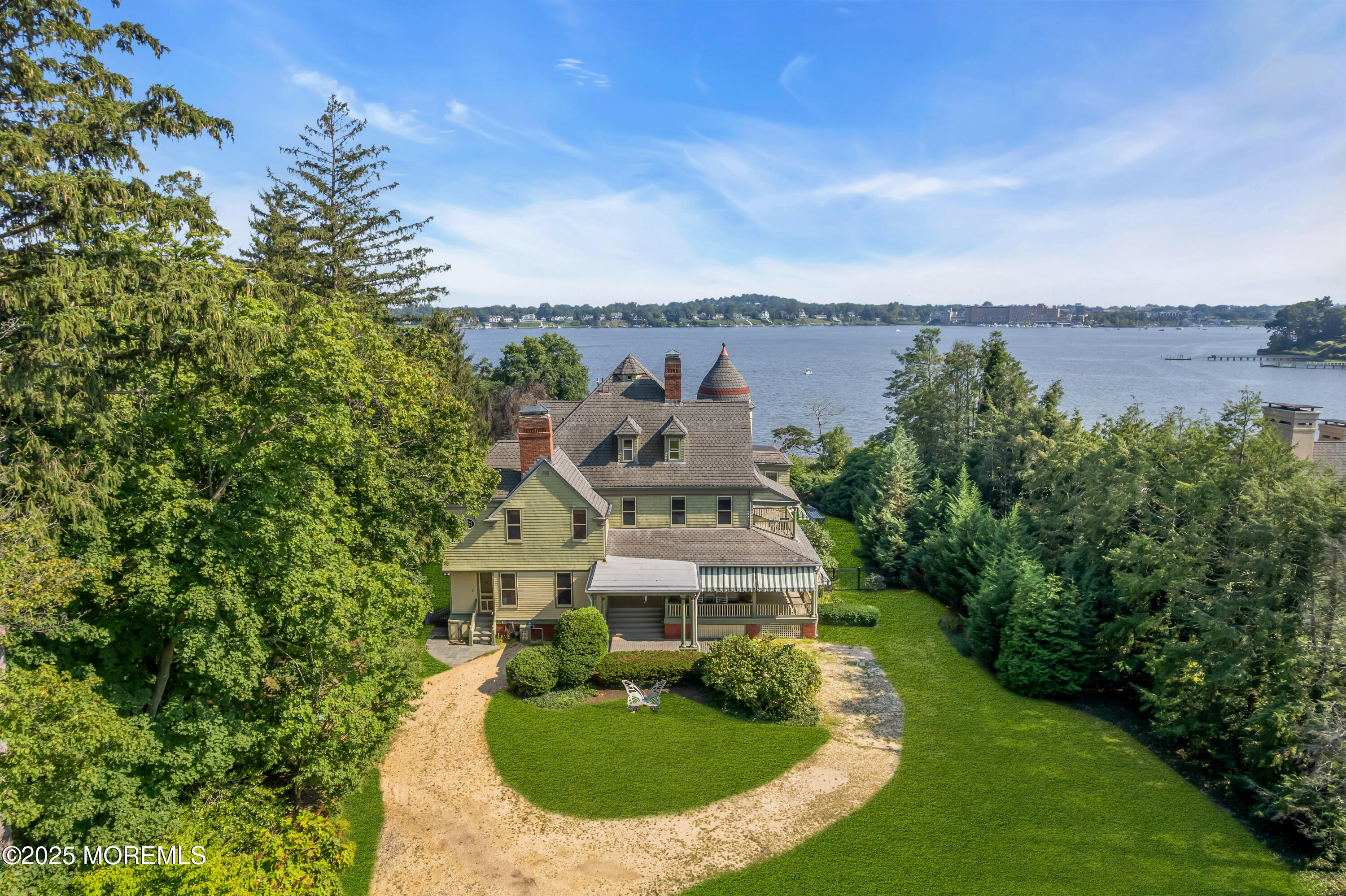 458 Navesink River Road Red Bank, NJ 07701 - Photo 12 of 118 an aerial view of a house with outdoor space and lake view