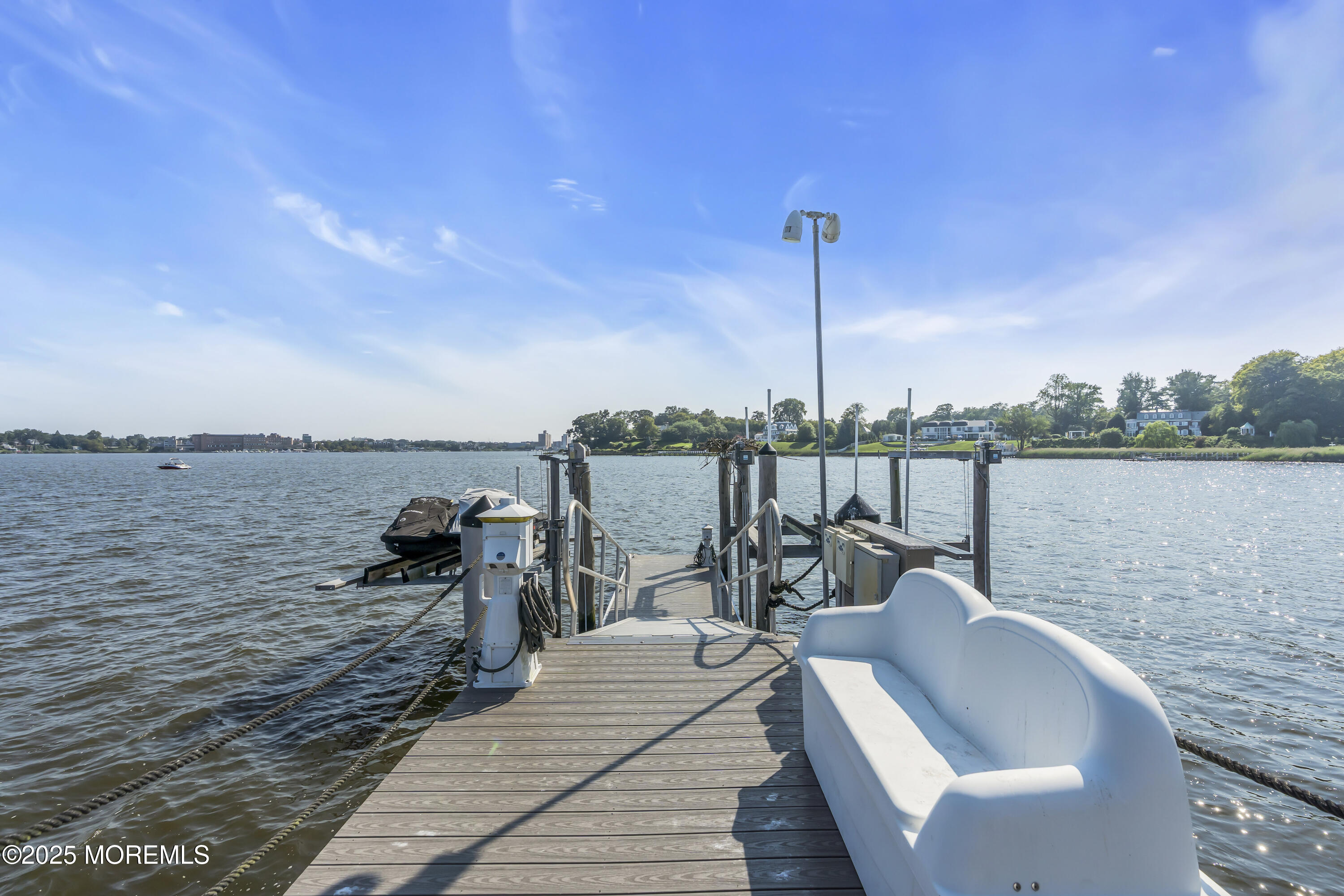 458 Navesink River Road Red Bank, NJ 07701 - Photo 23 of 118 a view of a terrace with wooden floor and lake view