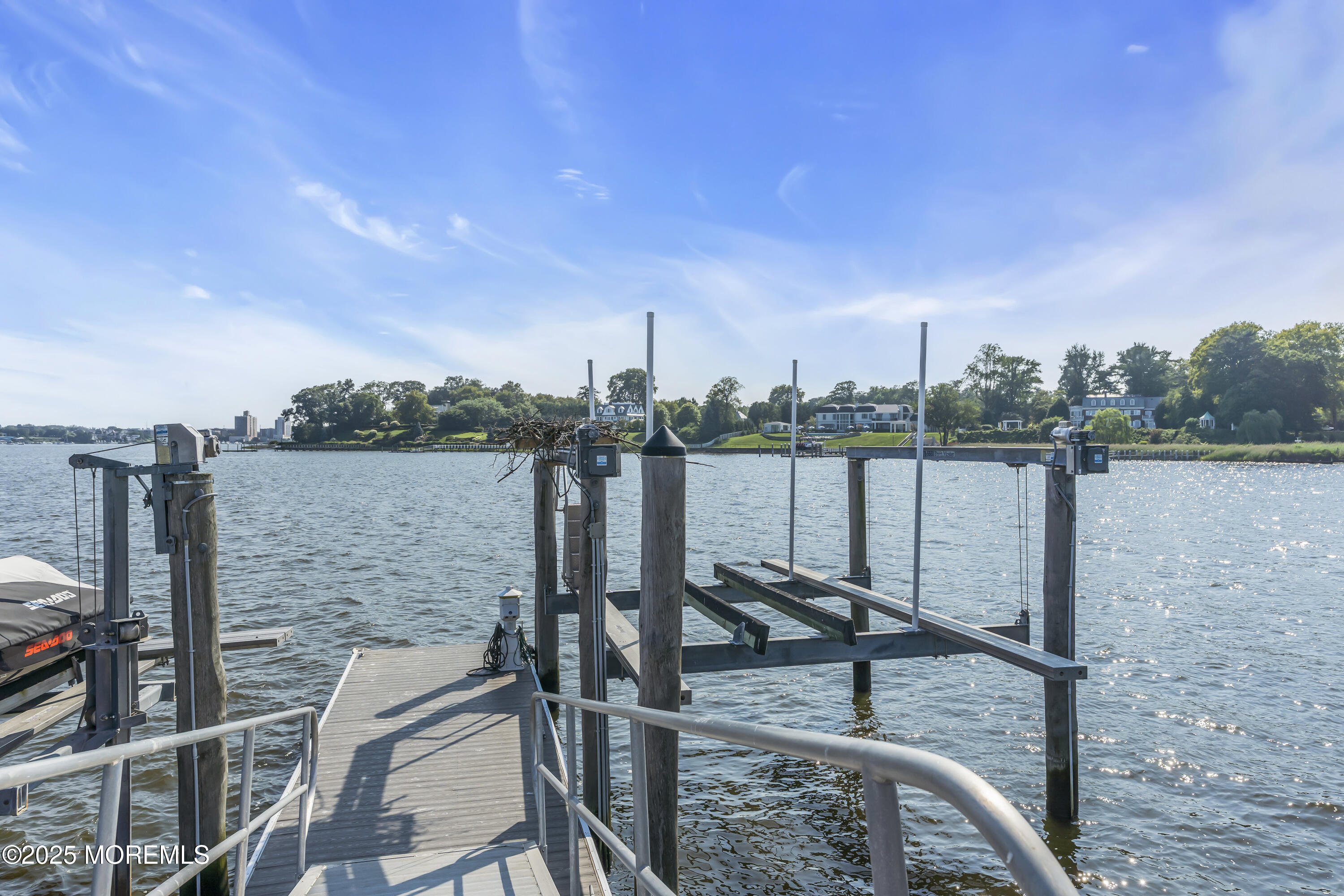 458 Navesink River Road Red Bank, NJ 07701 - Photo 25 of 118 a view of a lake with sitting area