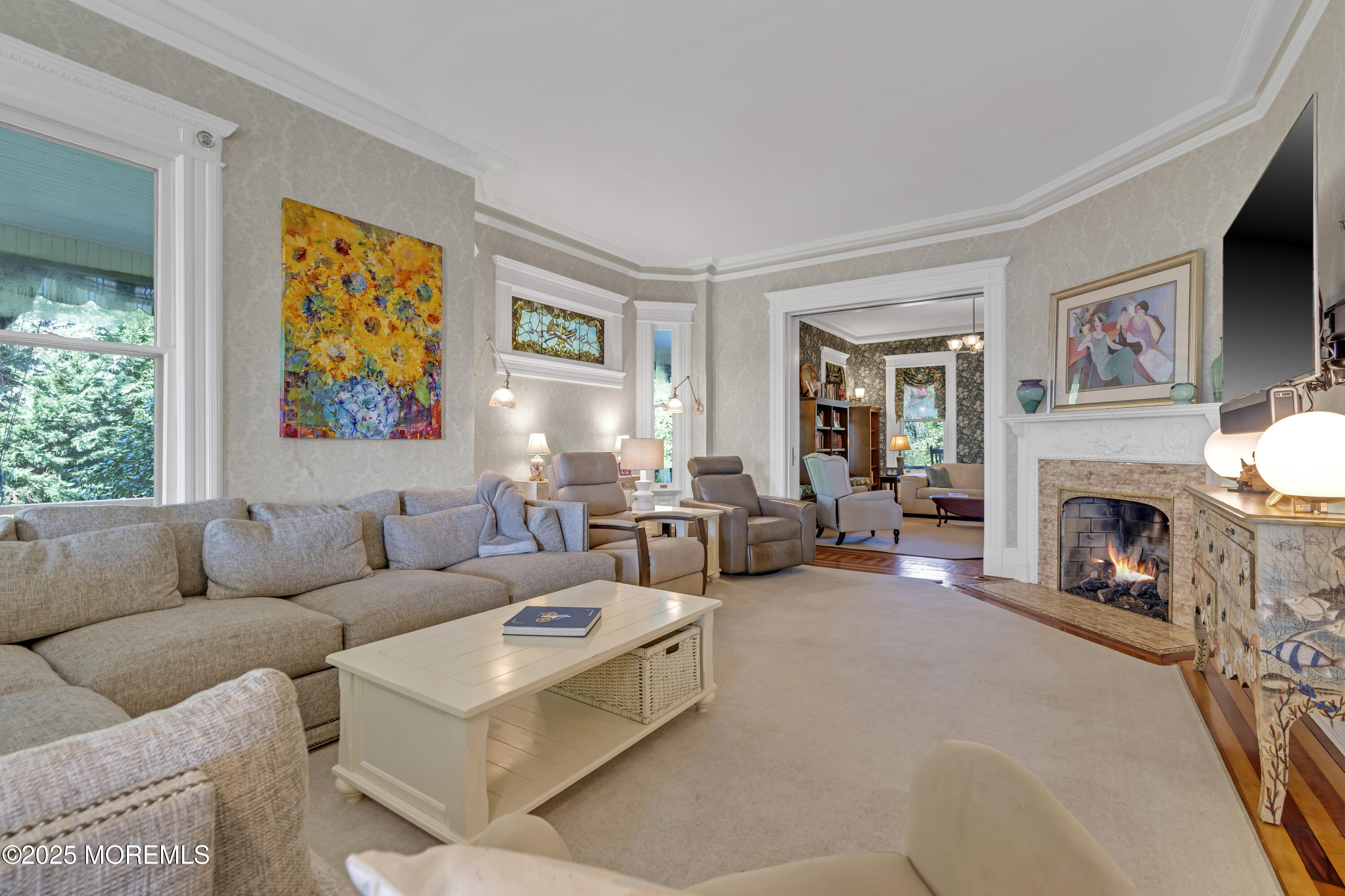 458 Navesink River Road Red Bank, NJ 07701 - Photo 40 of 118 a living room with furniture large window and a fireplace