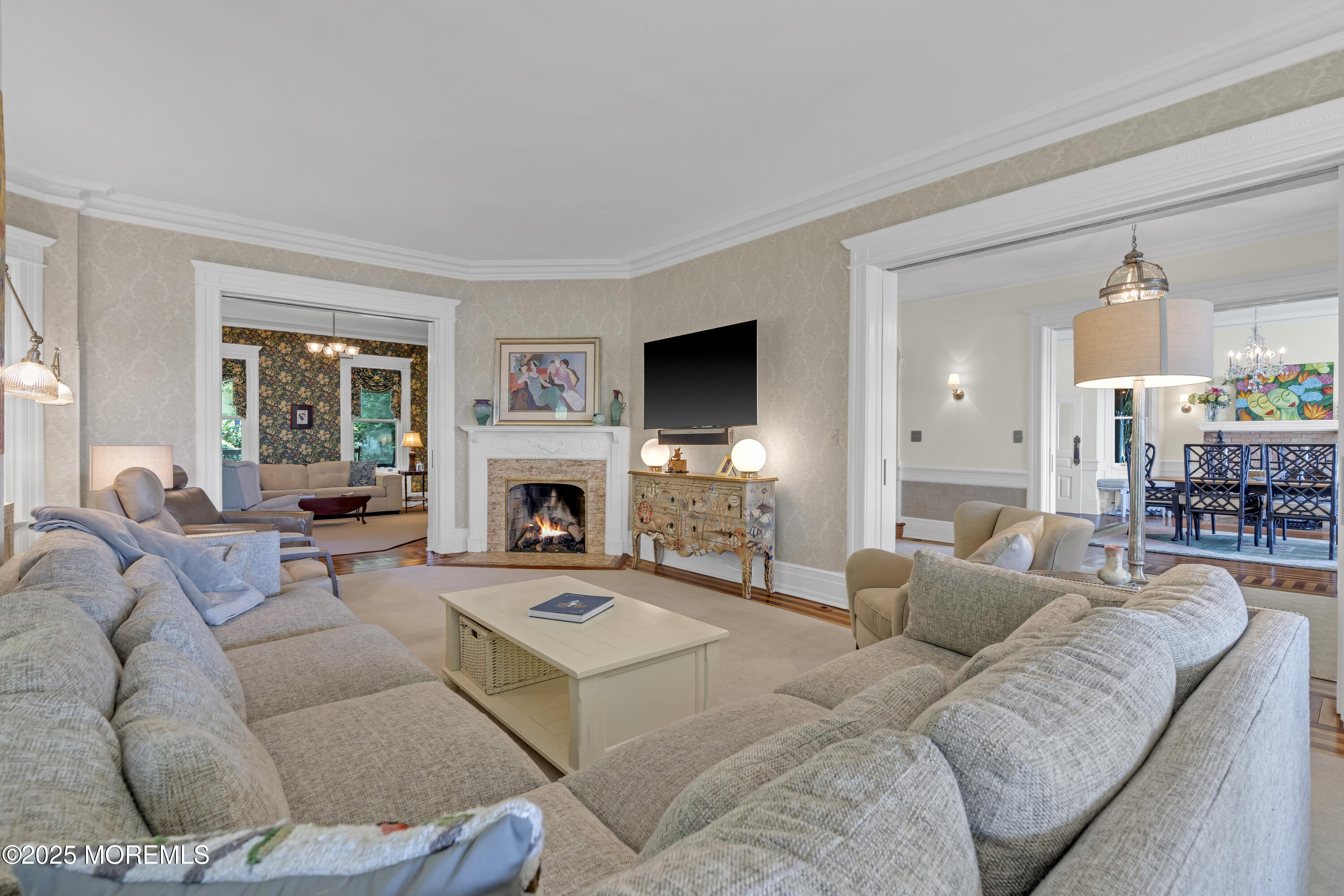 458 Navesink River Road Red Bank, NJ 07701 - Photo 41 of 118 a living room with furniture a large window and a fireplace