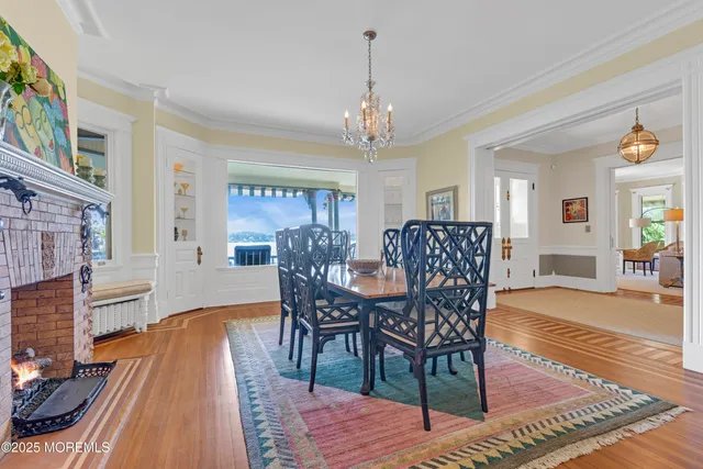 a view of a lake with houses in back