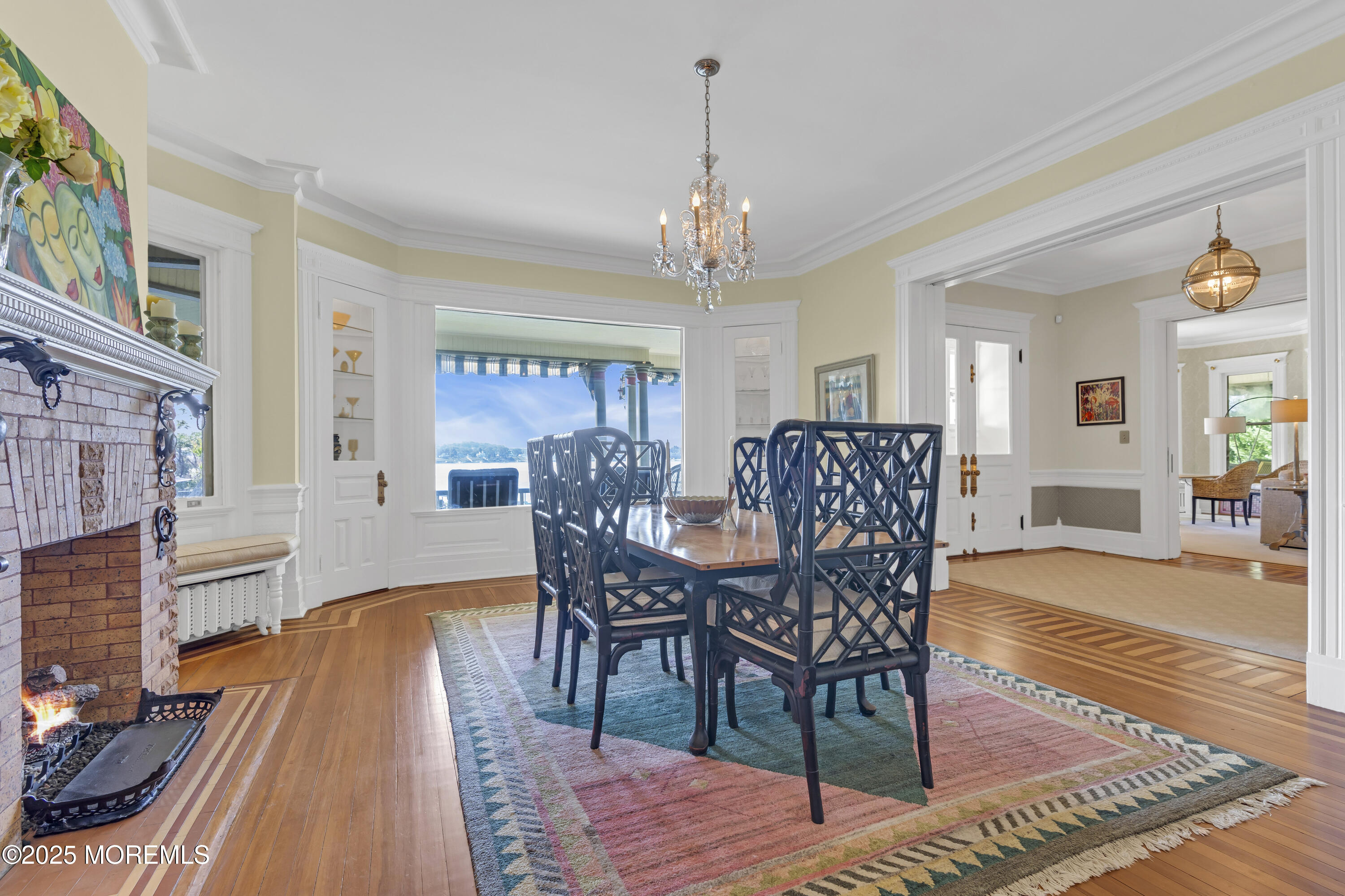 458 Navesink River Road Red Bank, NJ 07701 - Photo 43 of 118 a view of a dining room with furniture window and wooden floor