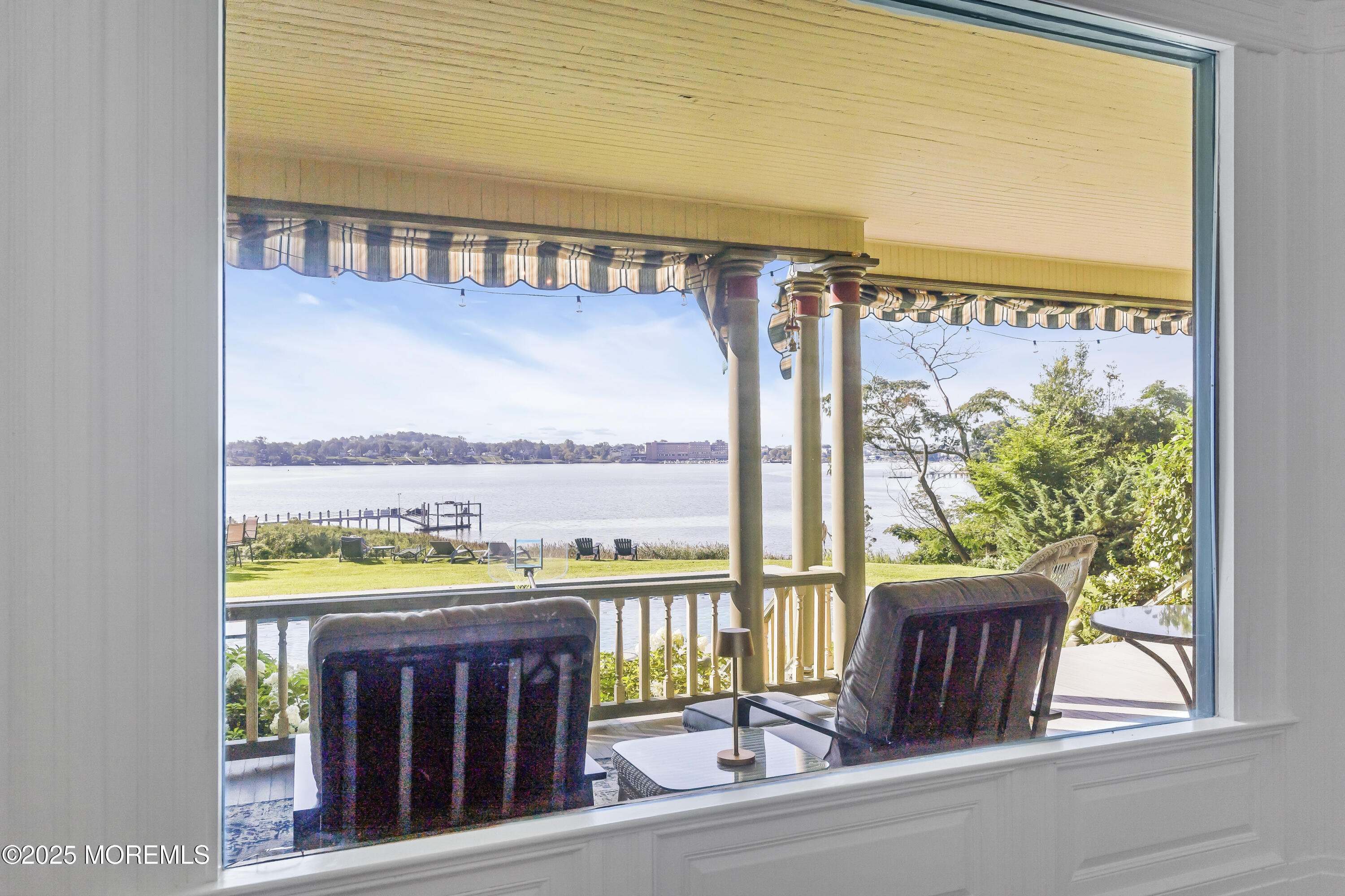 458 Navesink River Road Red Bank, NJ 07701 - Photo 44 of 118 a view of a two chairs and table in a balcony