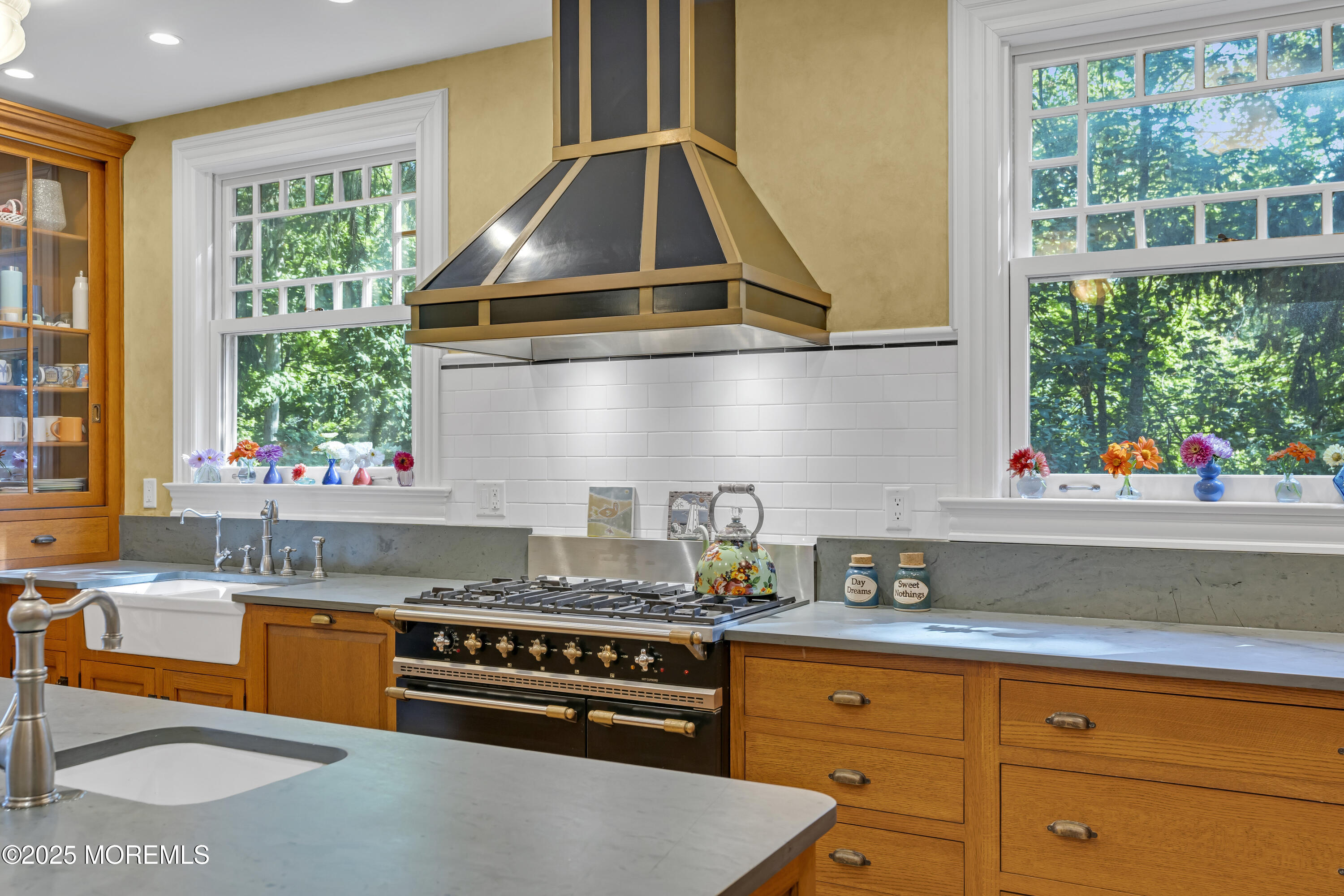 458 Navesink River Road Red Bank, NJ 07701 - Photo 54 of 118 a kitchen with stainless steel appliances granite countertop a sink and a stove