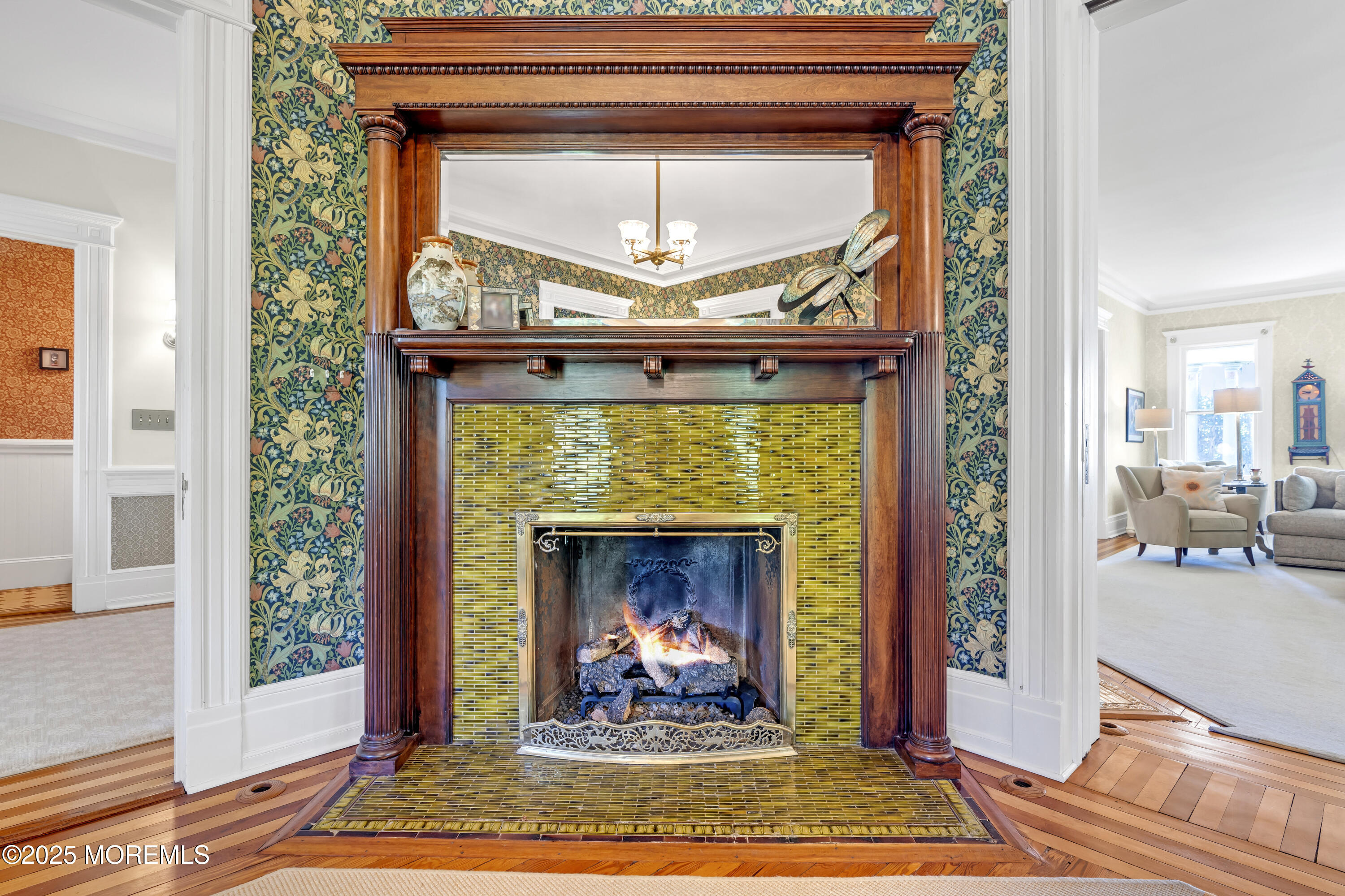 458 Navesink River Road Red Bank, NJ 07701 - Photo 57 of 118 a living room with a fireplace windows and a rug
