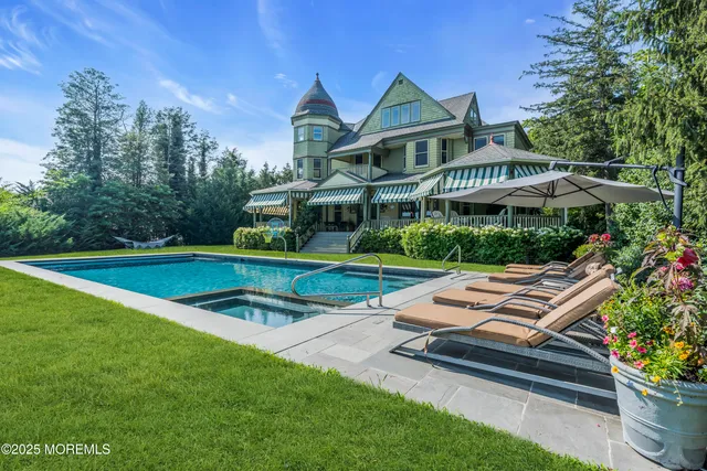 a view of a terrace with wooden floor and lake view